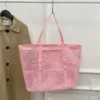 S149729b45a9e4154ae867aefab8d43d1z.webp Portable Mesh Beach Bag For Women Makeup Travel Storage Wash Bag Summer Travel Swimming Bath Bag Organizer Shopper Totes
