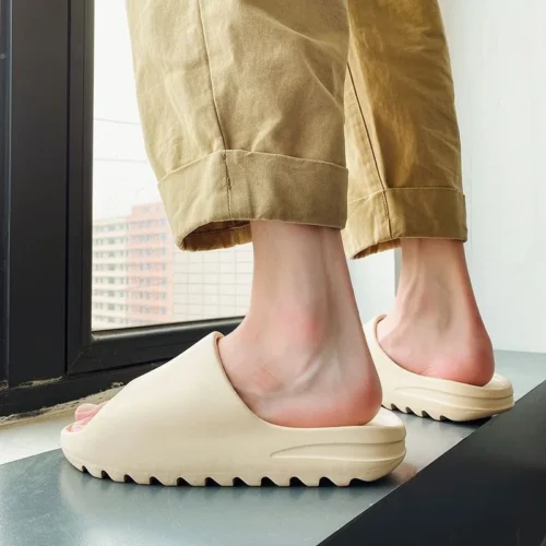 S426fa3b62a8046fc80a49e636db5d0dc4.webp Hot sales Coconut Slippers Cloud Thick-soled Sandals Summer Fashion Soft Bottom Beach Men Slippers Women's Sandals EVA Slides