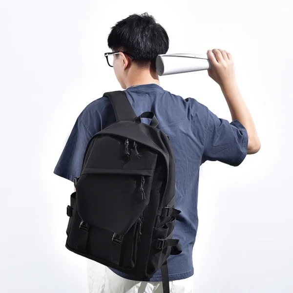 S613258ecc1c6429fa09e571aa3b3e284z.webp Simple solid color backpack, travel backpack, plenty of storage space, very suitable for commuting, school, work and going out.