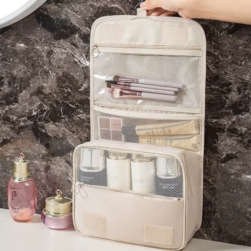 S892a1087c11045fabe8211bafc59ec71g.webp Travel Hanging Makeup Bag Large Capacity Portable Hand-held Storage Wash Bag with Simple Hook for Cosmetic Organization